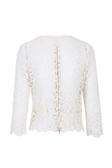 Rückenansicht des Blusentops mit halben Arm und Rückwertigen Reißverschluss aus naturweißer Macramée Spitze mit Paisley Muster